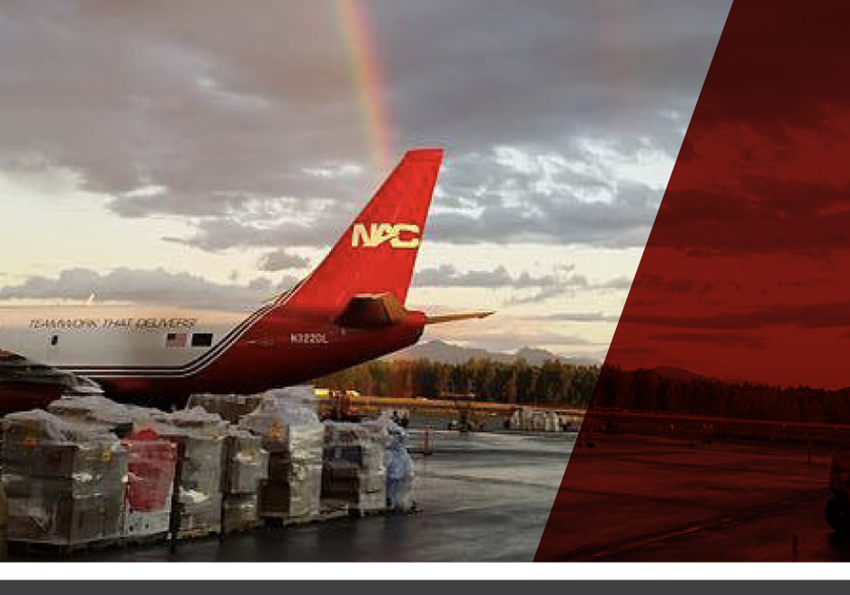 Photo of a NAC plane with a rainbow in the sky. Photo of a NAC plane with a rainbow in the sky.